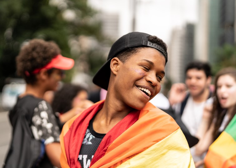 person with pride flag